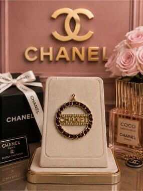 CHANEL Gold & Burgundy Circle Logo Pendant Necklace zipper pull